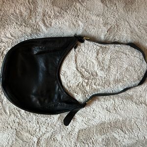 Vintage Used Black Coach Leather Bag. 16 in. wide & 15 in. tall.